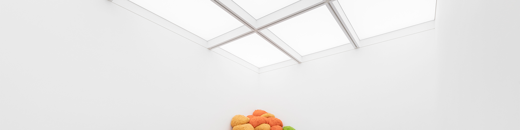 Bright meeting room with illuminated backlit fabric ceilings